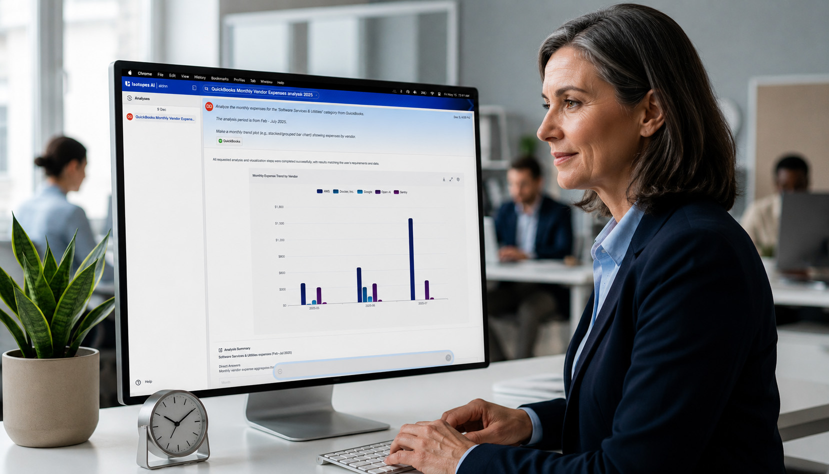 Business analyst reviewing vendor expense analytics dashboard in Isotopes AI aidnn software platform.